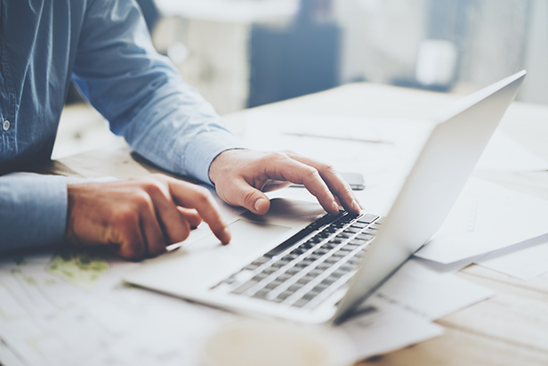 man working at computer