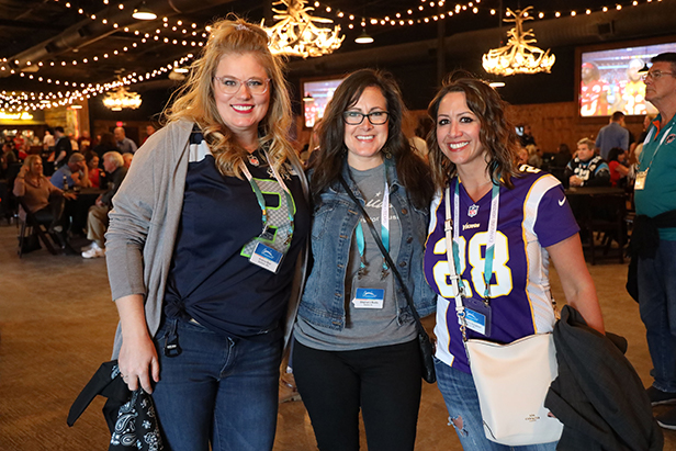 Attendees enjoying the ASB Super Bowl party at River Ranch Stockyards.