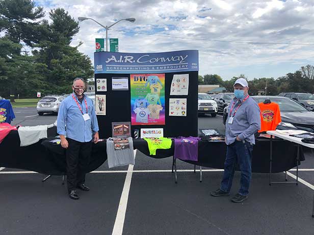 Brian Conway (left), owner of Collingdale, PA-based A.I.R. Conway, exhibits at his first trade show since the COVID-19 outbreak.