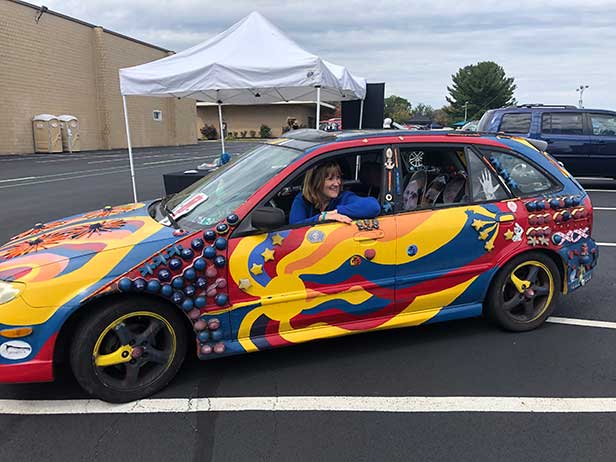 Everybody wants to take a spin in the ASI Promocar, freshly cleaned during the shutdown.