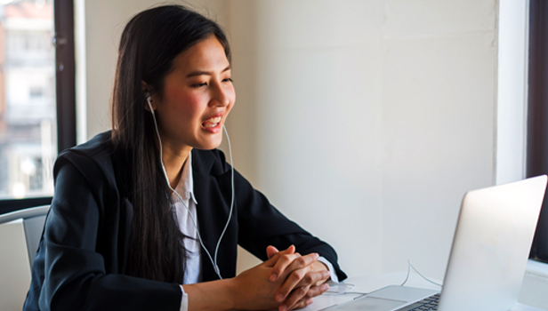 woman sitting at computer