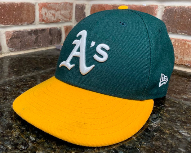 Green and yellow Oakland A's baseball cap