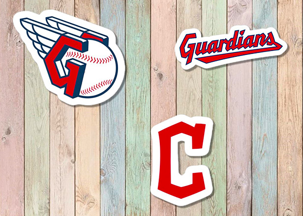 Cleveland Guardians stickers on wood background