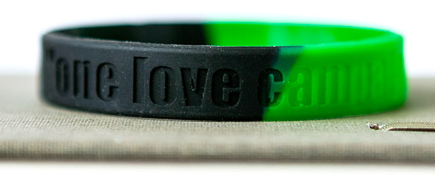 black and green debossed bracelet