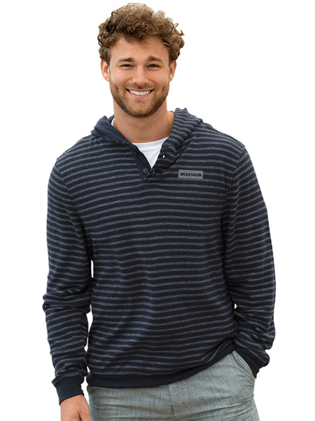 man wearing striped pullover shirt