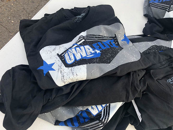 UWA Elite relies upon branded merch like T-shirts to spread awareness of the independent wrestling company.