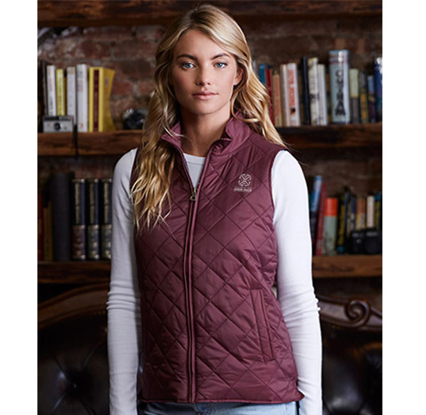 woman in maroon quilted vest