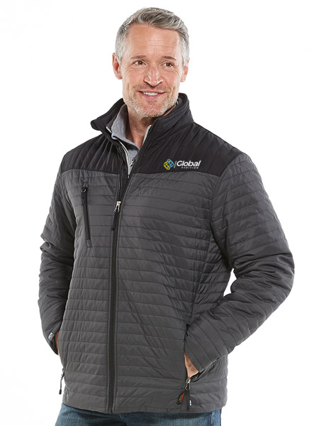 man wearing black and gray insulated quilt jacket