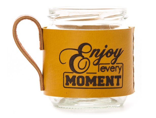 glass jar mug with leather sleeve and handle