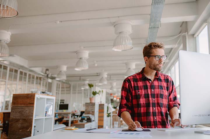 Young man in front of computer