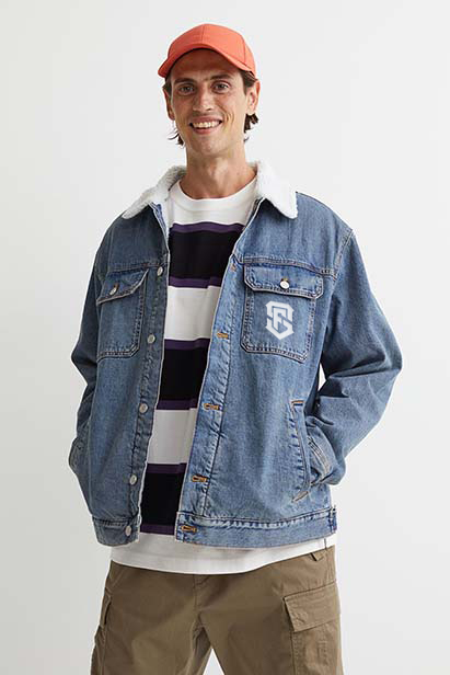 man wearing denim jacket