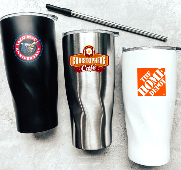 three stainless-steel tumblers with reusable straw