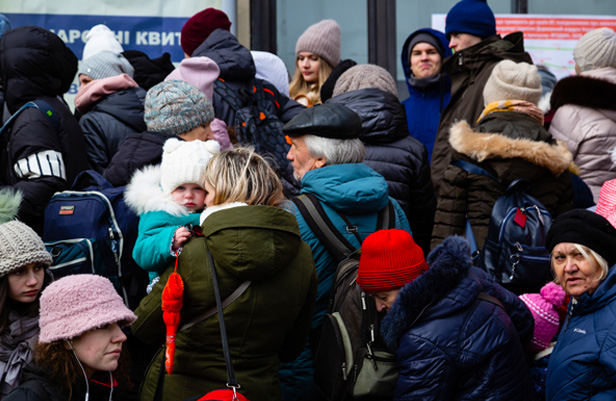 Ukrainian refugees at train station