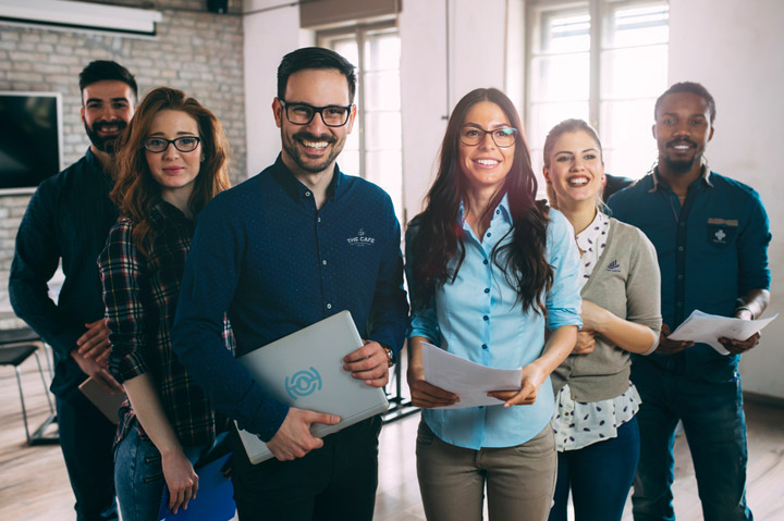 happy young employees, men and women