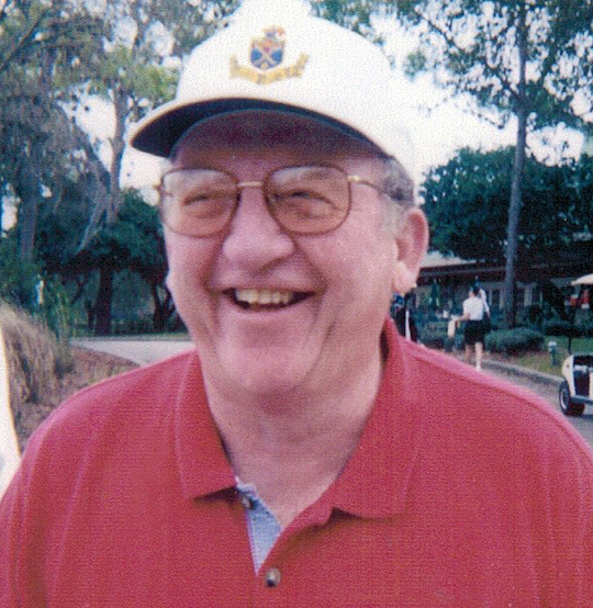 Bob Finn, smiling wearing red shirt and white cap