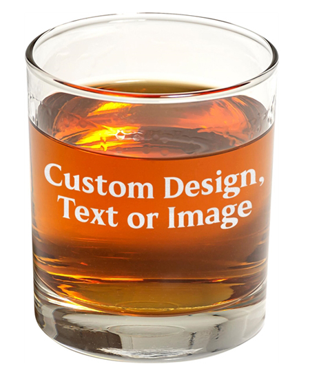 engraved whiskey glass, filled with whiskey