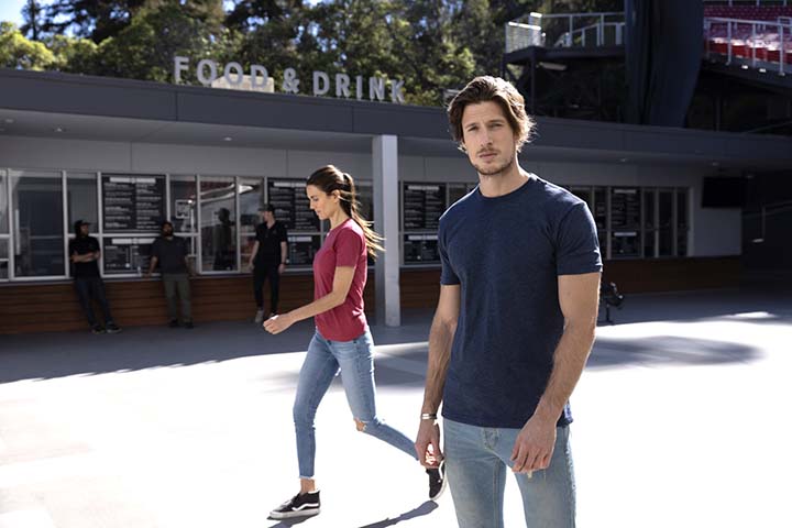 Young couple outside a food & drink store