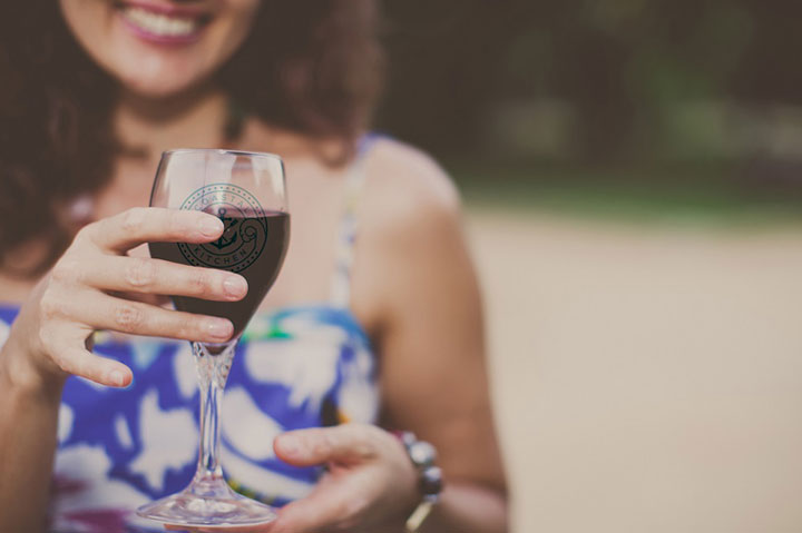 Woman holding a glass of red wine