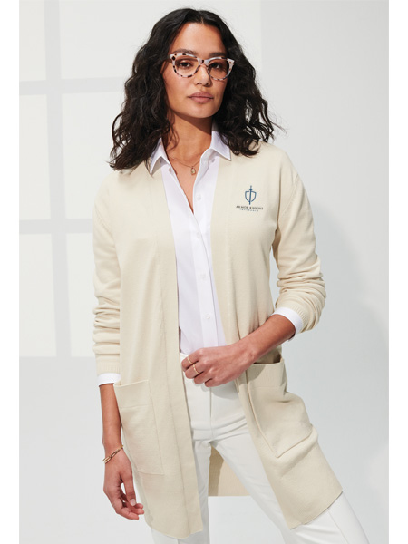 dark-haired woman wearing beige cardigan