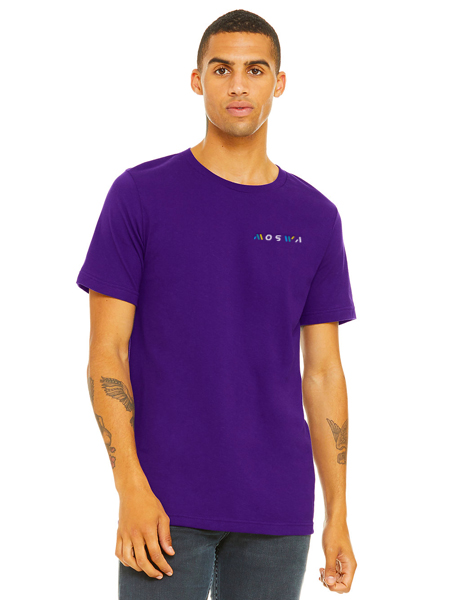 man wearing purple t-shirt and jeans