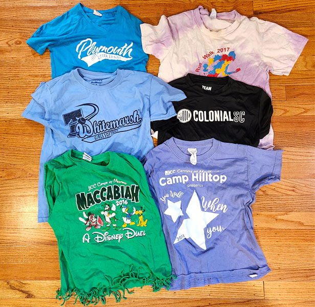 group of logoed t-shirts