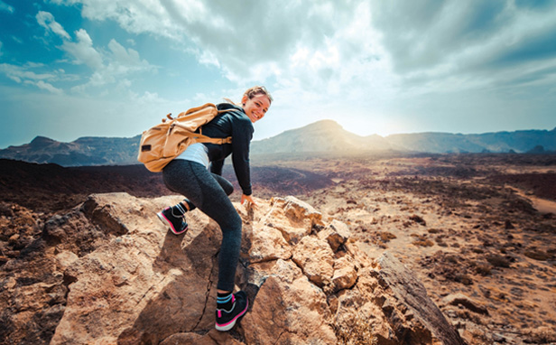 woman hiker, carrying backpack