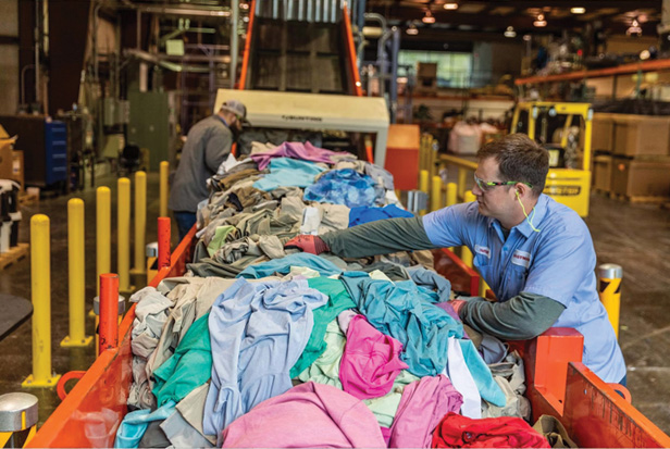 man sorting clothes