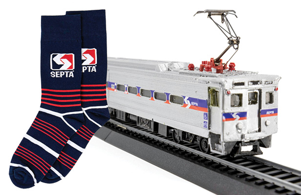 Septa socks next to Septa model train