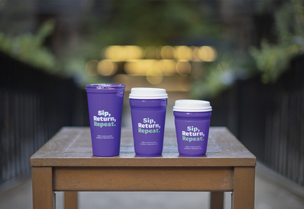 reusable cups sitting on table