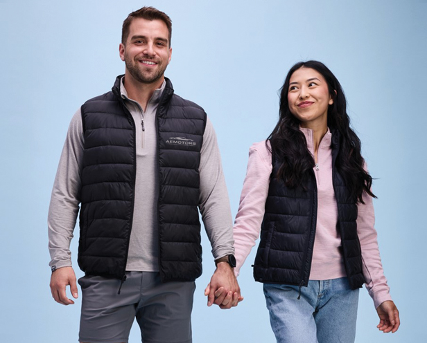 man and woman wearing puffer vests