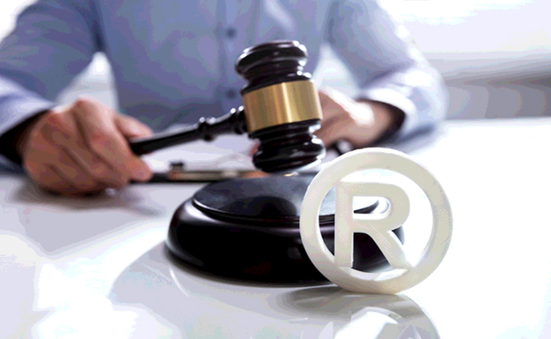 gavel and trademark symbol