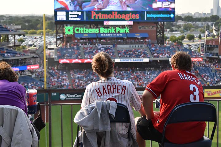 A couple shows their support with Bryce Harper jerseys