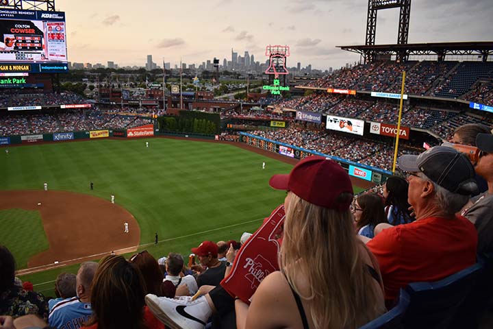 A fan waves her foam finger during the game